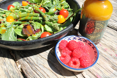 Asparagus, green leaves & tomatoes with Raspberry Dressing